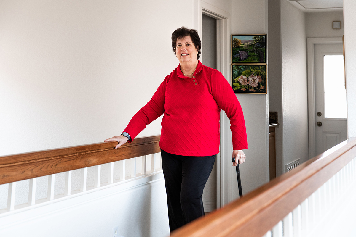 Amy standing upstairs