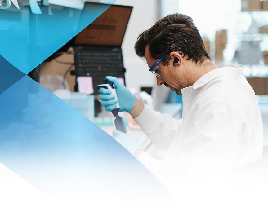 A lab technician pulling a sample