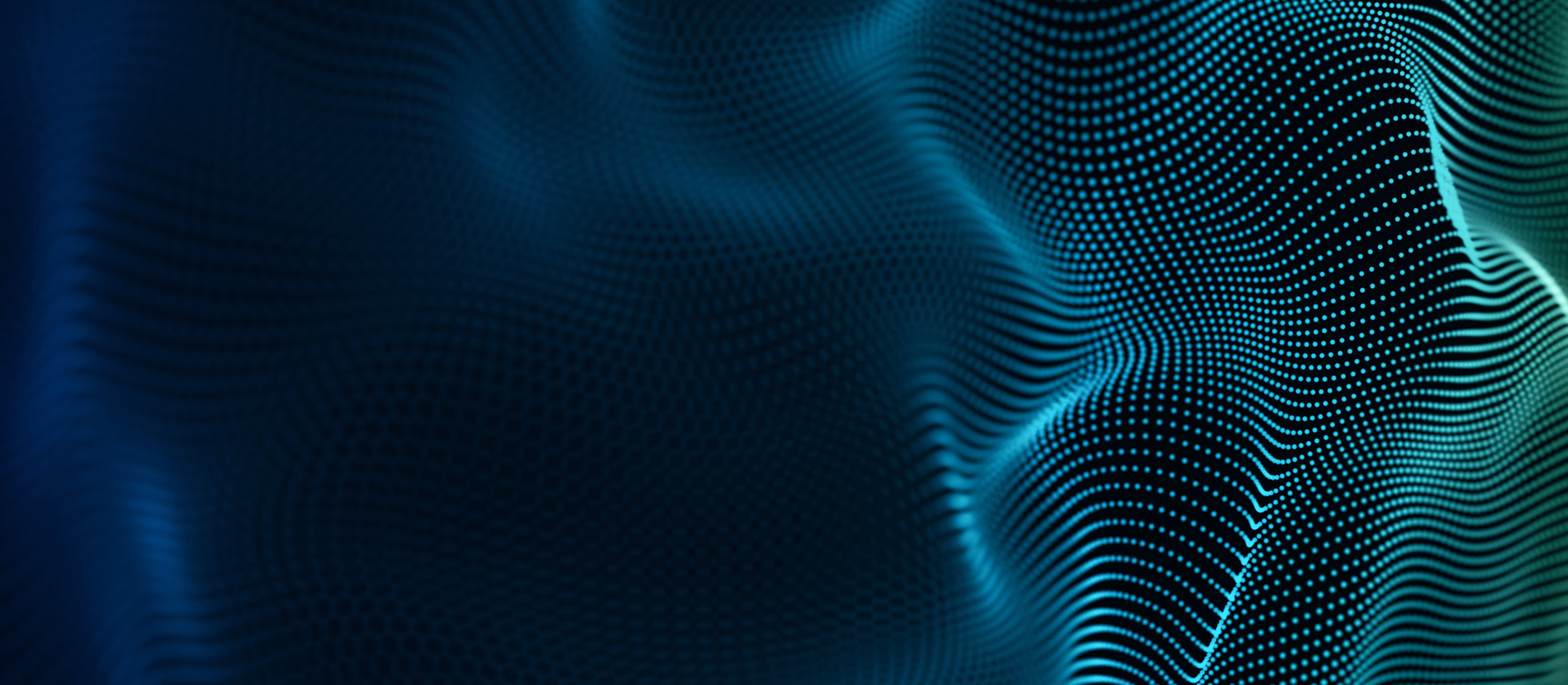 black background with blue and green dots in a pattern